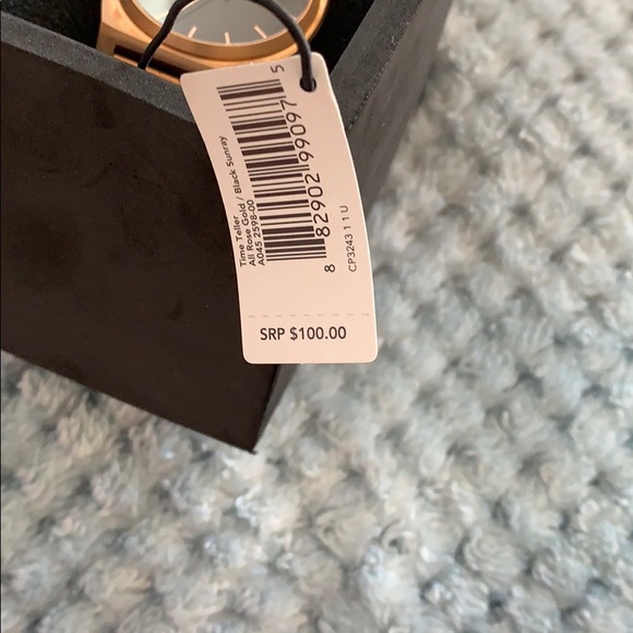 Nixon rose gold watch